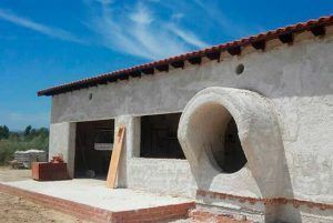 Vivienda bioclimática con espacio invernadero
